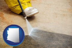 arizona map icon and pressure washing a concrete surface