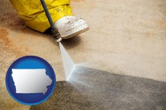 iowa map icon and pressure washing a concrete surface