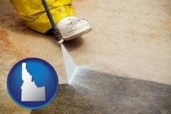 idaho map icon and pressure washing a concrete surface