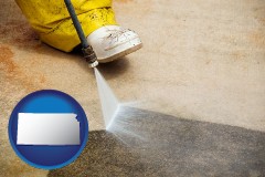 kansas map icon and pressure washing a concrete surface
