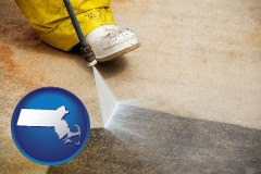 massachusetts map icon and pressure washing a concrete surface