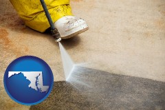 maryland map icon and pressure washing a concrete surface