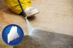 maine pressure washing a concrete surface