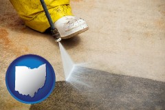 ohio map icon and pressure washing a concrete surface