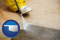 oklahoma map icon and pressure washing a concrete surface
