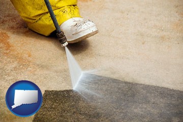 pressure washing a concrete surface - with Connecticut icon