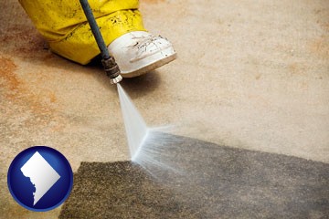 pressure washing a concrete surface - with Washington, DC icon