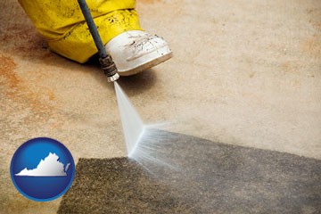 pressure washing a concrete surface - with Virginia icon